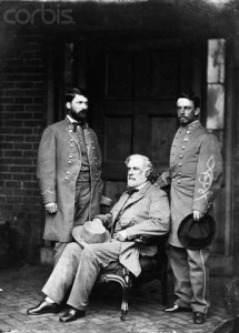 Confederate General Robert E. Lee, seated, with 2 of his officers, photographed by Mathew Brady in April, 1865, following Lee's surrender to General Ulysses S. Grant at the Appomattox Court House in Richmond, Virginia. 