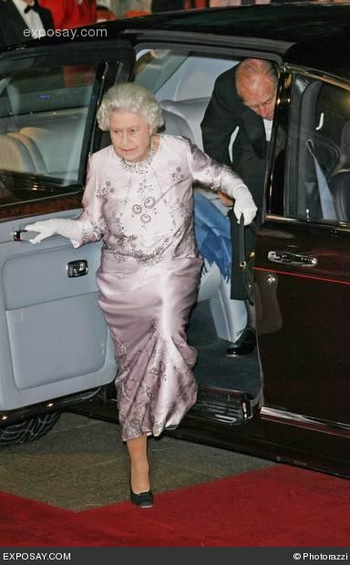 Queen Elizabeth (with black leather purse) and Prince Philip arrive at the Casino Royale World Premiere - Red Carpet - Nov. 14, 2006, London 