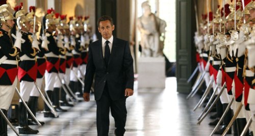 French President Nicolas Sarkost arrives at Versailles Palace on June 22, 2009, to address Parliament. H condemned the use of the burqa in France, calling it an unacceptable symbol of "enslavement." 