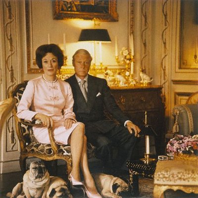 the Duke and Duchess of Windsor at home with their precious pug dogs. The Duchess, the former Wallis Warfield Simpson, often appeared in her stylish best in public with a pug tucked under one arm. It became a fashion trend - to carry a dog around with you when away from home. 