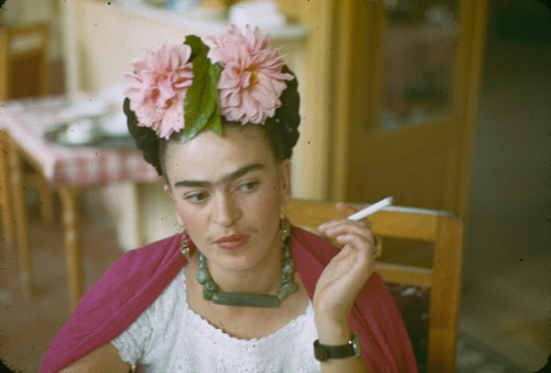 Frida Kahlo smoking,  photograph by her friend and lover Nickolas Muray, ca. 1940
