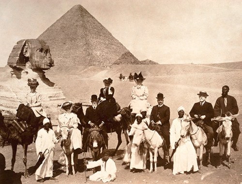 British tourists pose in about 1910 at Giza outside Cairo, the Sphinx over their shoulders. Agatha Christie, too, visited this spot in 1910 but was not as interested in Egyptology and archaeology then as she would be in later years. 