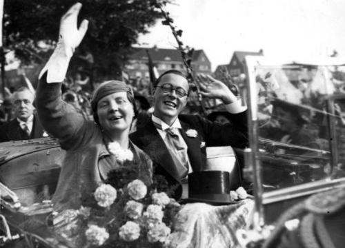 Princess Juliana and Prince Bernhard celebrate their engagement 1936. Note the white carnation in the Prince's lapel.