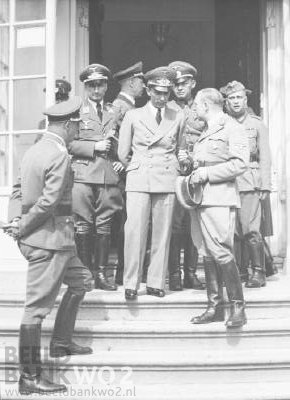 German propaganda minister Joseph Goebbels is shown at the entrance to Queen Wilhelmina's residence, the Noordeinde Palace in The Hague on Carnation Day. The nonviolent protest demonstration by the Dutch citizens greatly alarmed their German occupiers. Hitler was informed and the Nazis began their crackdown on Dutch life, liberty, and the pursuit of happiness.