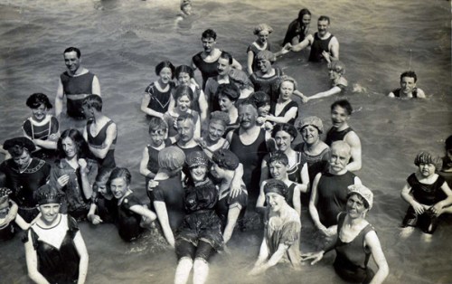 Here is a mixed group of bathers photographed in Eastbourne around 1906. Mixed bathing in England became widely accepted at about this time.