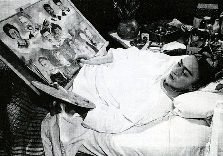 Frida Kahlo painting in bed. Undated photo