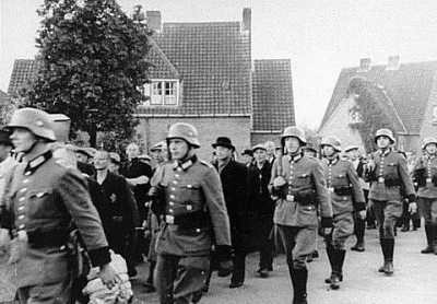 German Nazis round up Dutch Jews for deportation to Poland's death camps. WWII. Photo undated. 