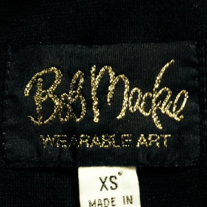 The tag from Mandy Denson's vintage Bob Mackie shirt.